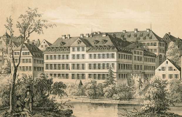 Eine alte Ansicht zeigt ein großes Haus am Fluss Neckar. Es hat 4 Stockwerke und viele Fenster.
